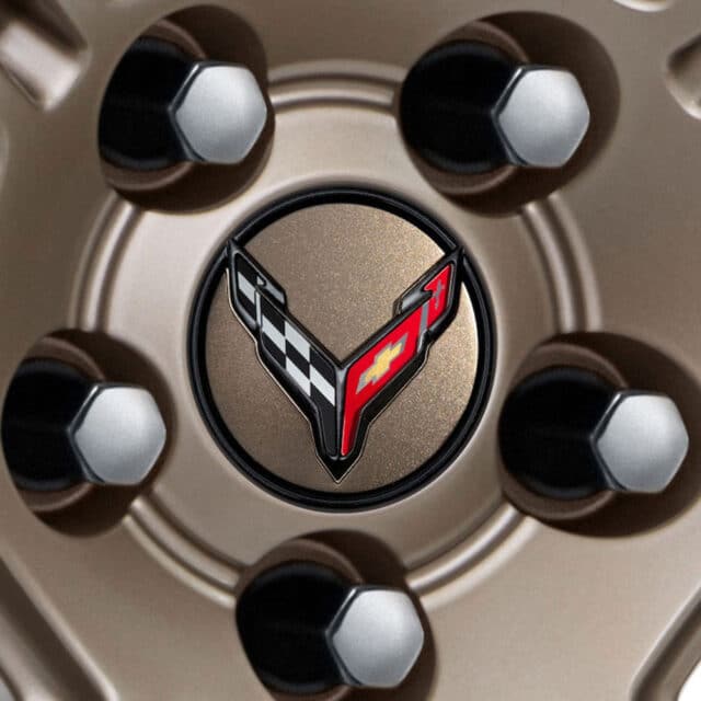 GM C8 Corvette Center Caps - Tech Bronze with Crossed Flags - 84384896 - Close up view