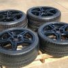 GM C8 Open Spoke Gloss Black Corvette Wheel & Michelin Tire Package - Angle View