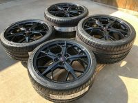 GM C8 Trident Gloss Black Corvette Wheel & Michelin Tire Package - Angle View